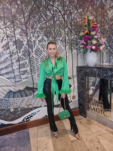 green satin top wth feathers