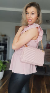 Pink clutch bag